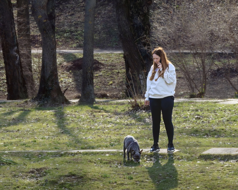 Woman with dog in the park